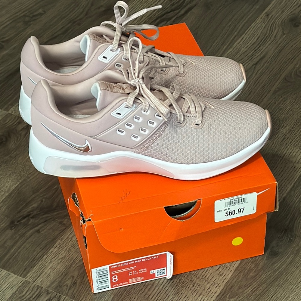 Nike Pink Athletic Shoes with Sleek Design